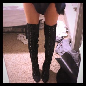 Thigh high lace up boots